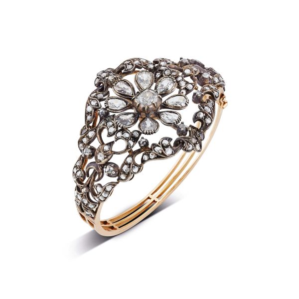 



DIAMOND FLORAL BRACELET IN SILVER AND 18KT YELLOW GOLD
