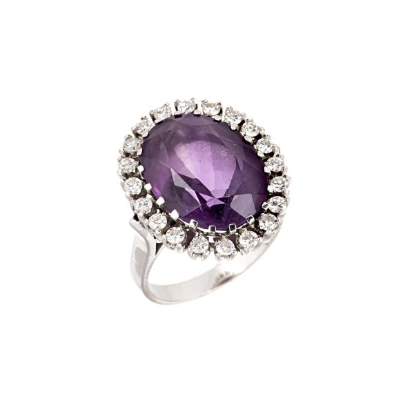 



ANELLO A MARGHERITA CON AMETISTA E DIAMANTI