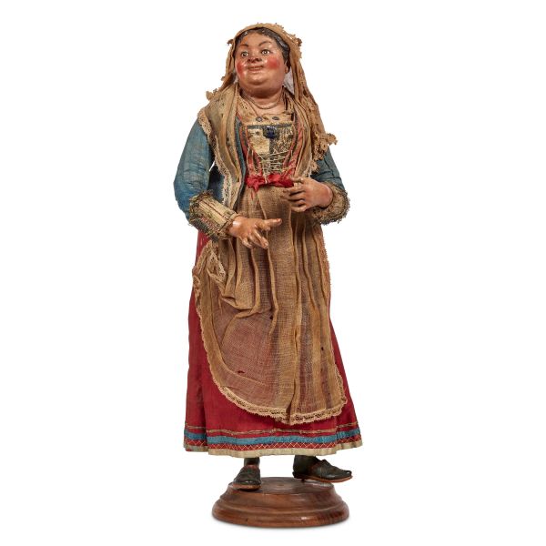 



A WOMAN IN FESTIVE CLOTHES, NAPLES, 18TH CENTURY