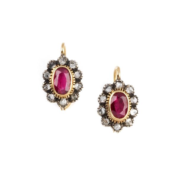 



RUBY AND DIAMOND FLOWER-SHAPED EARRINGS IN GOLD AND SILVER 