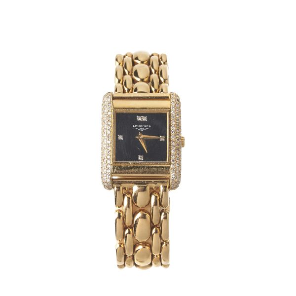 Longines - 



LONGINES LADY'S WATCH IN 18KT YELLOW GOLD