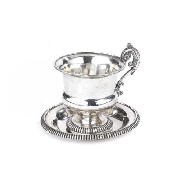 A SILVER CUP AND SOUCERS, TURIN, 1850 CIRCA
