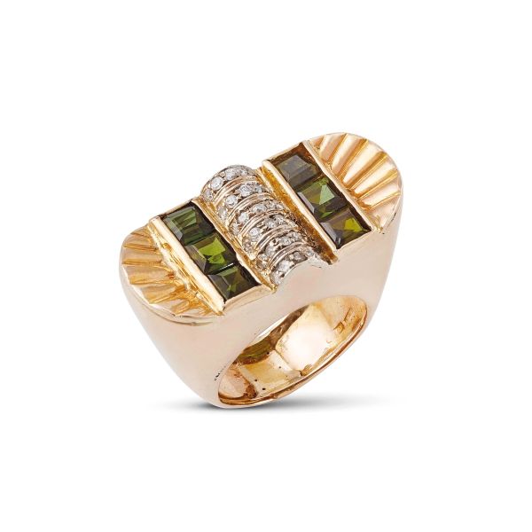 Codognato - 



CODOGNATO PERIDOT AND DIAMOND BAND RING IN 18KT TWO TONE GOLD