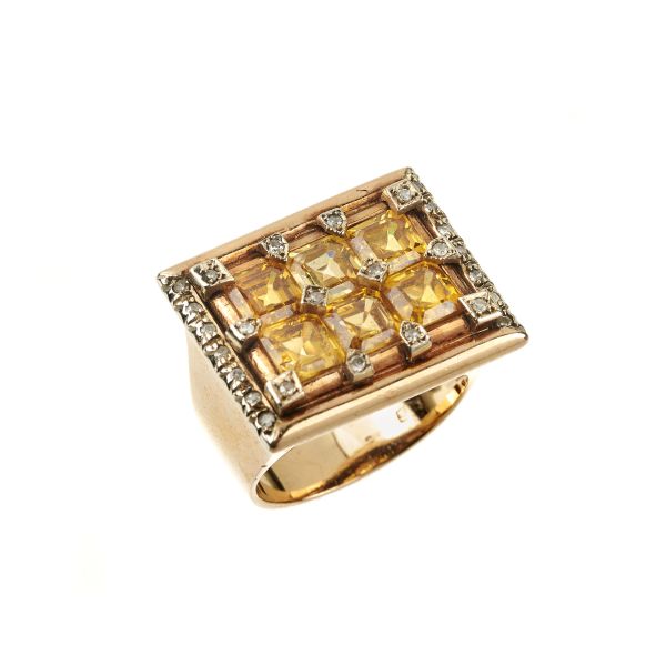 



ANELLO A FASCIA CON QUARZI CITRINI E DIAMANTI 
