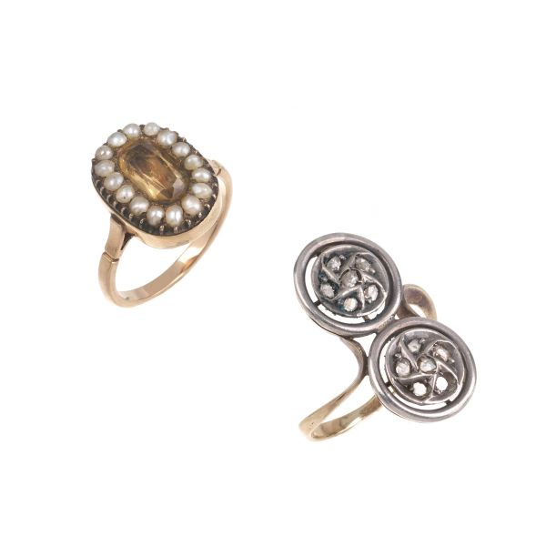 LOT COMPOSED OF TWO RINGS IN SILVER AND GOLD
