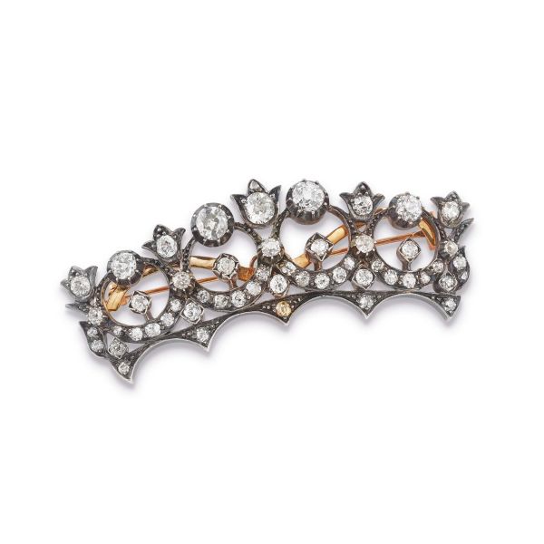 



DIAMOND CROWN-SHAPED BROOCH IN YELLOW GOLD AND SILVER 