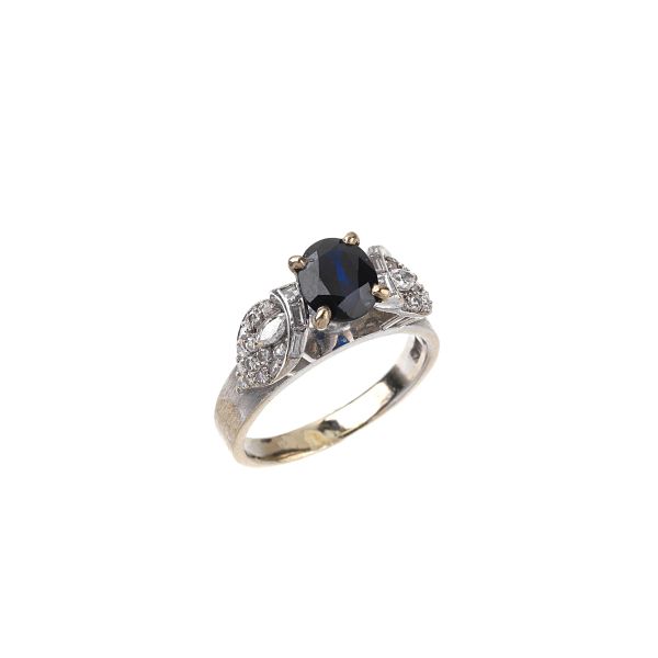 



SAPPHIRE AND DIAMOND RING IN 18KT WHITE GOLD