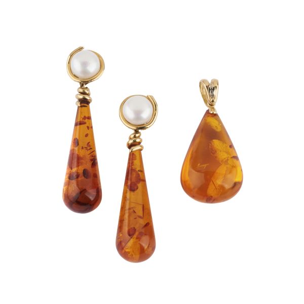 



AMBER AND PEARL DEMI PARURE IN 18KT YELLOW GOLD