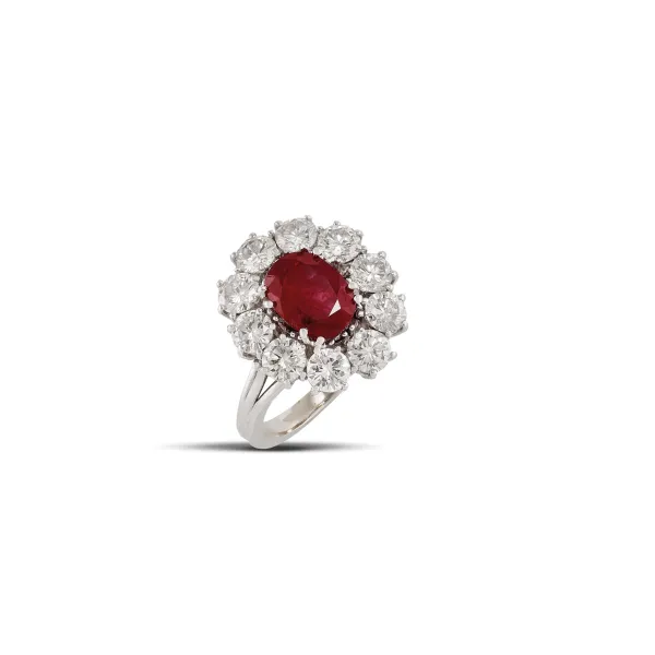 



RUBY AND DIAMOND DAISY RING IN 18KT WHITE GOLD