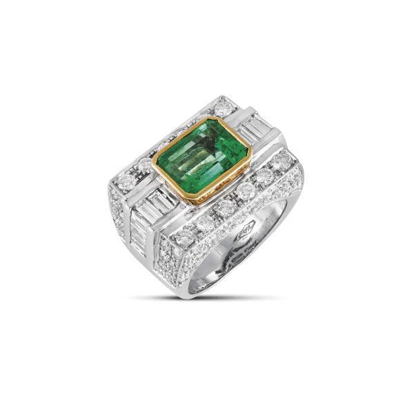 



COLOMBIAN EMERALD AND DIAMOND BAND RING IN 18KT TWO TONE GOLD