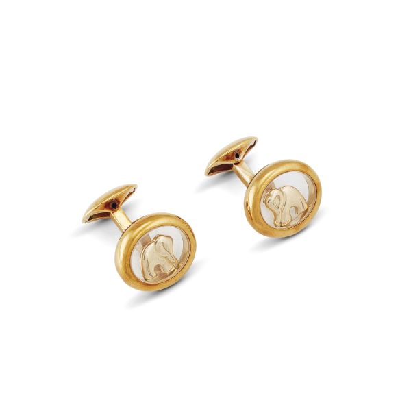 CHOPARD "FLOATING ELEPHANT" CUFFLINKS IN 18KT YELLOW GOLD