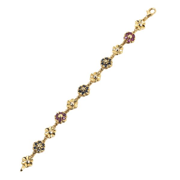 



RUBY, SAPPHIRE AND DIAMOND BRACELET IN 18KT TWO TONE GOLD