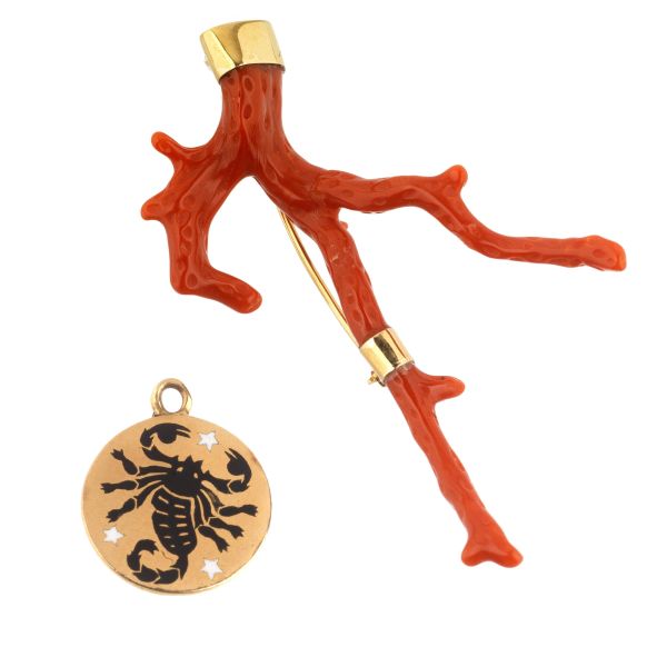 CORAL BRANCH BROOCH IN 18KT YELLOW WITH A SMALL MEDAL GOLD SHOWING A ZODIAC SIGN