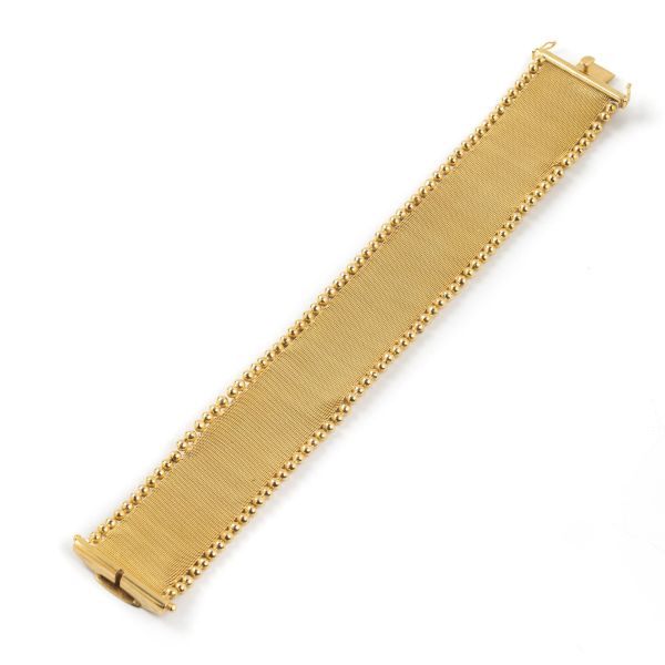 



MESH BRACELET IN 18KT YELLOW GOLD