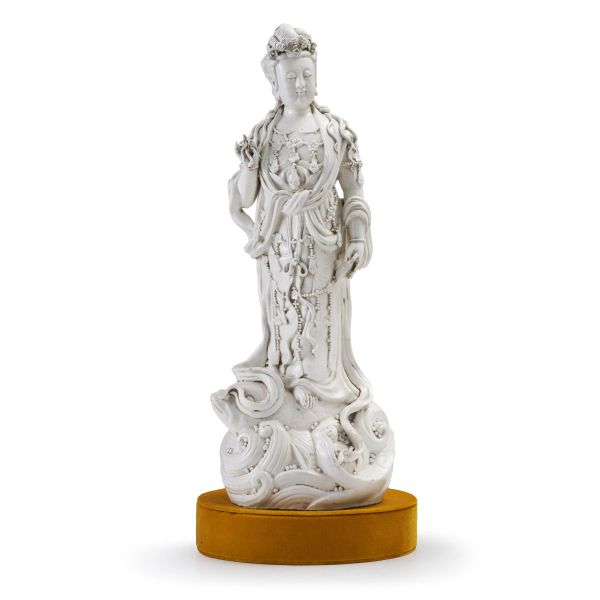 



A DEHUA-STYLE BLANC DE CHINE FIGURE OF GUANYIN, CHINA, 20TH CENTURY