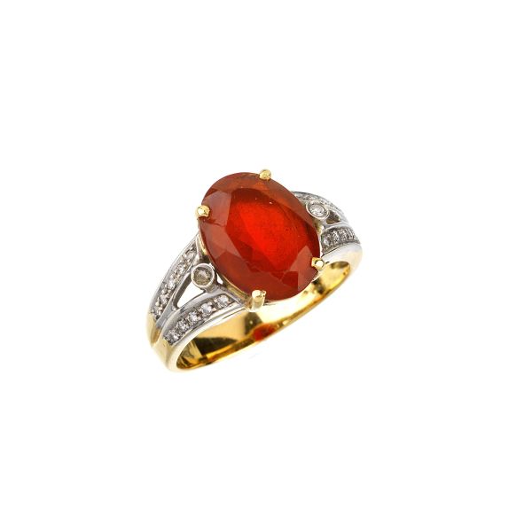 



FIRE OPAL AND DIAMOND RING IN 18KT TWO TONE GOLD