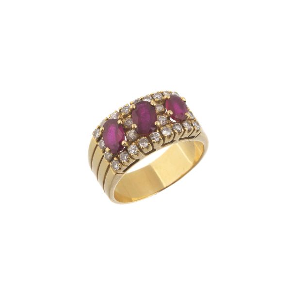 RUBY AND DIAMOND BAND RING IN 18KT YELLOW GOLD