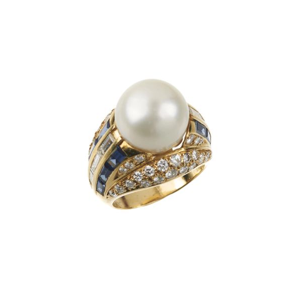



ANELLO CON PERLA ZAFFIRI E DIAMANTI