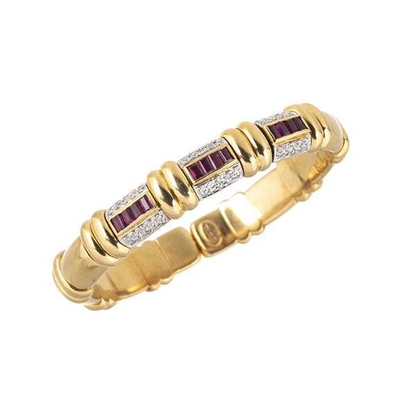 



BRACCIALE RIGIDO CON DIAMANTI E RUBINI