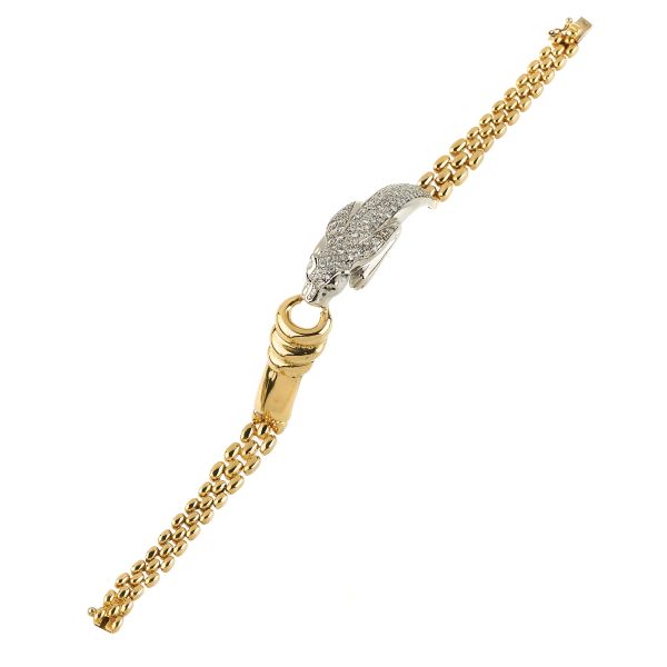 



PANTHER-SHAPED BRACELET IN 18KT TWO TONE GOLD