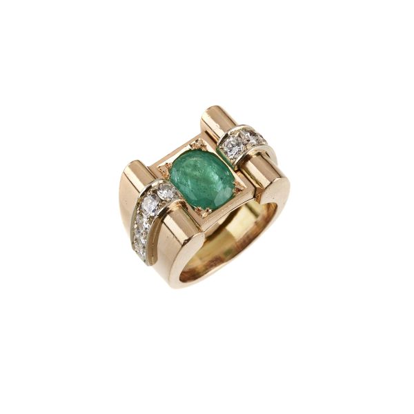 



EMERALD AND DIAMOND BAND RING IN 18KT TWO TONE GOLD