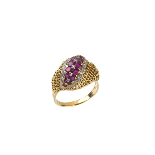 



RUBY AND DIAMOND DOME RING IN 18KT TWO TONE GOLD