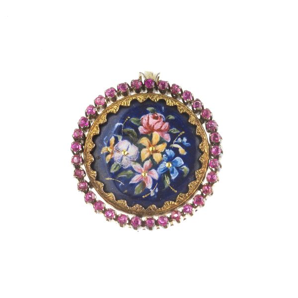 PENDANT/BROOCH IN SILVER AND GOLD WITH A FLORAL PATTERN