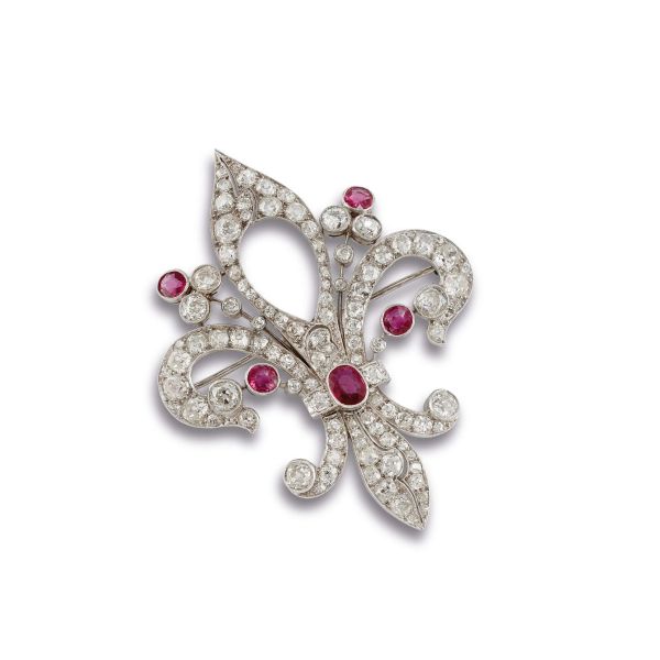 



RUBY AND DIAMOND LILY-SHAPED BROOCH IN 18KT WHITE GOLD