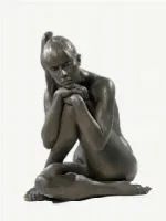  Scultura, sec. XX,  rappresentate figura femminile seduta, in metallo, alt. 