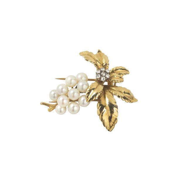 



SPILLA CON PERLE E DIAMANTI