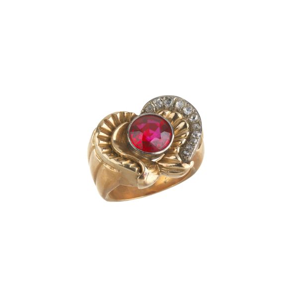 RED STONE AND DIAMOND RING IN 18KT TWO TONE GOLD