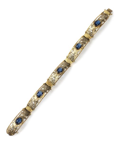



BRACCIALE A FASCIA CON PIETRE SINTETICHE 