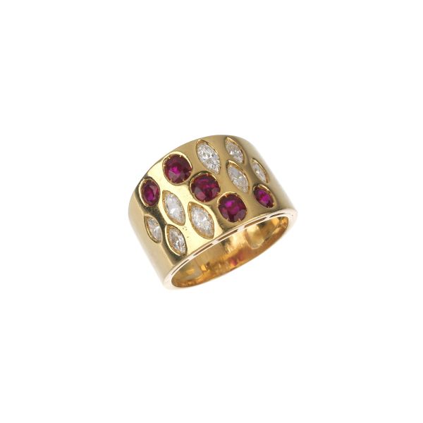 



RUBY AND DIAMOND WIDE BAND RING IN 18KT YELLOW GOLD