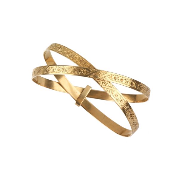 COUPLE OF BANGLES IN 18KT YELLOW GOLD