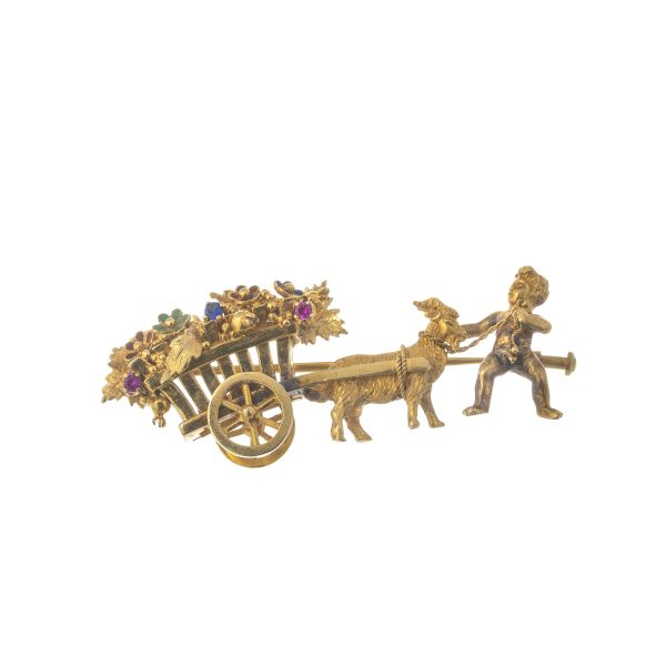 



WAGON-SHAPED BROOCH IN 18KT YELLOW GOLD 
