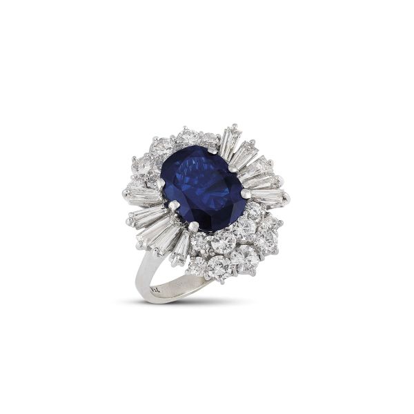 



BURMESE SAPPHIRE AND DIAMOND FLORAL RING IN 18KT WHITE GOLD