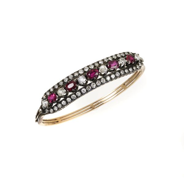DIAMONDS AND RUBIES BRACELET IN 14KT GOLD AND SILVER