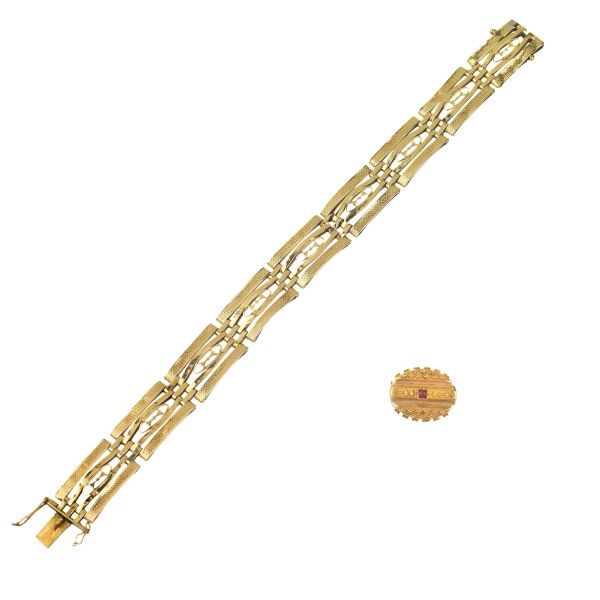 BRACELET WITH A PENDANT IN 14KT GOLD
