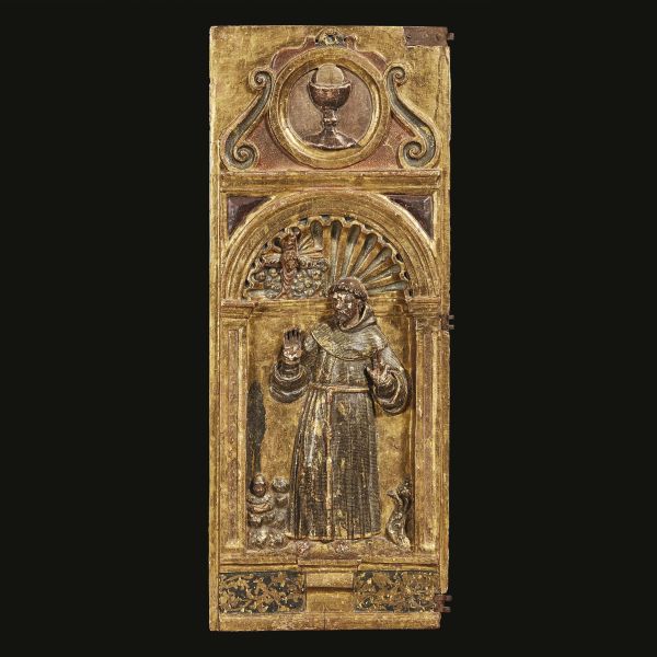 Northern Italian, 17th century, A part of a door, carved gilt and painted wood representing St. Francis, 89x36x3,5 cm