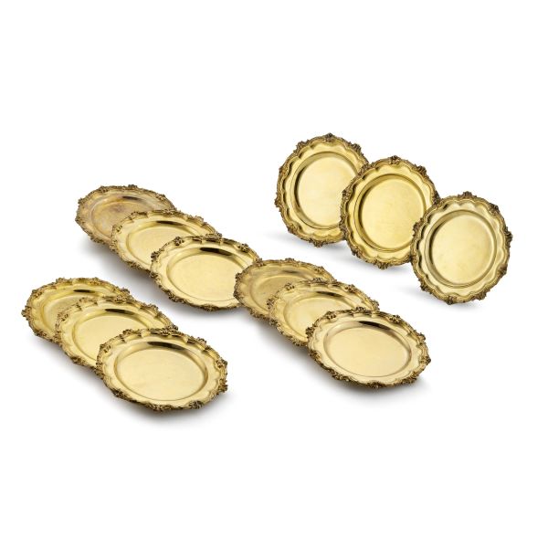TWELVE STERLING GILDED SILVER PLATES, LONDON, 1821, MARKS OF MICHAEL STARKEY