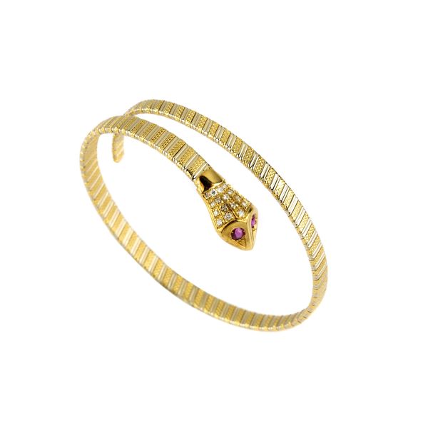 



SNAKE-SHAPED BANGLE BRACELET IN 18K TWO TONE GOLD