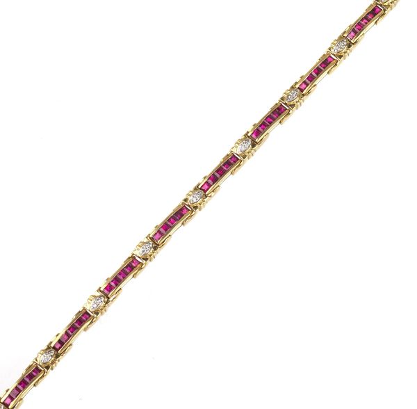 RUBY AND DIAMOND TENNIS BRACELET IN 18KT TWO TONE GOLD