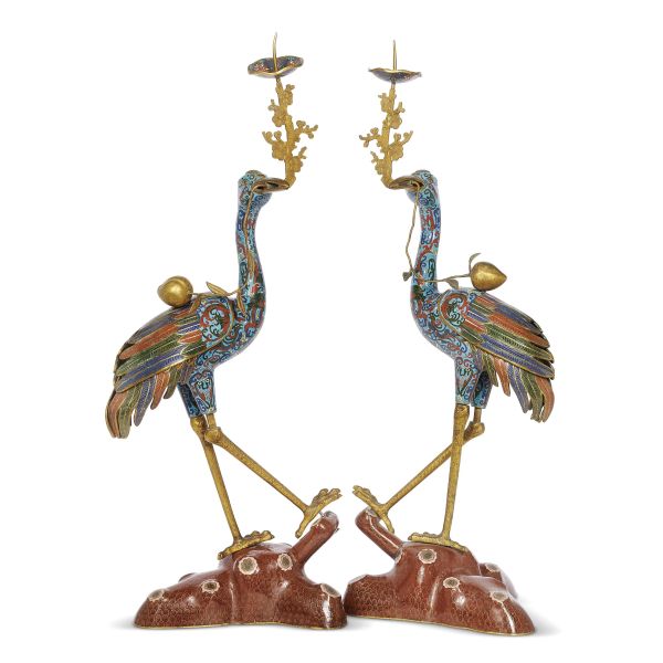 A PAIR OF CRANE CANDLE HOLDERS HOLDING MEI FLOWER POTS, CHINA, QING DYNASTY, FIRST HALF 20TH CENTURY