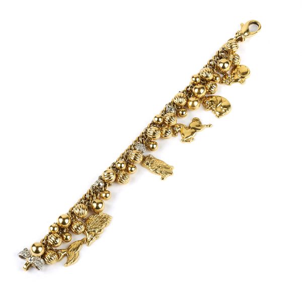 



CHAIN BRACELET WITH CHARMS IN 18KT YELLOW GOLD