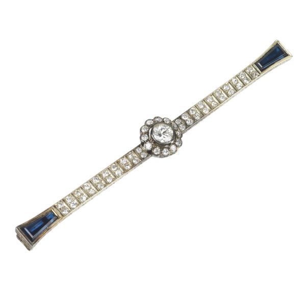 SYNTHETIC STONE BARRETTE BROOCH IN 18KT WHITE GOLD