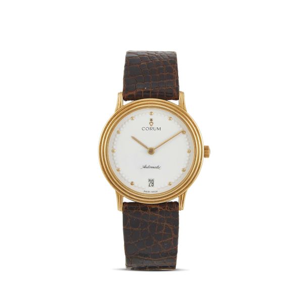 Corum - 



CORUM REF. 82.120.56 YELLOW GOLD WRISTWATCH, 1991