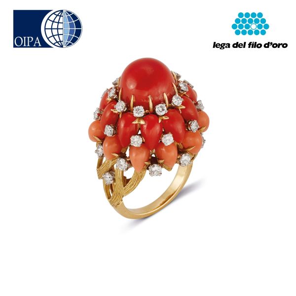 Bulgari - 



BULGARI CORAL AND DIAMOND DOME RING IN 18KT YELLOW GOLD AND PLATINUM 
