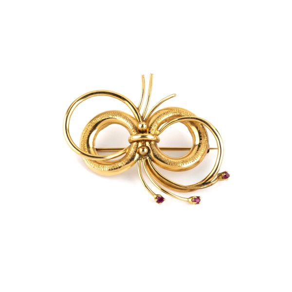 



RIBBON BROOCH IN 18KT ROSE GOLD