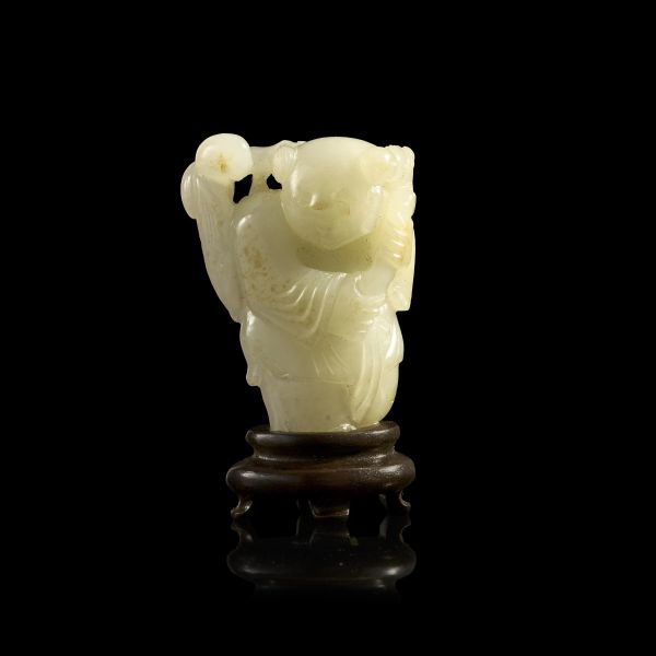 



A WHITE JADE FIGURE OF A BOY, CHINA, 19TH CENTURY 