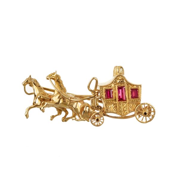 



SPILLA A FORMA DI CARROZZA 